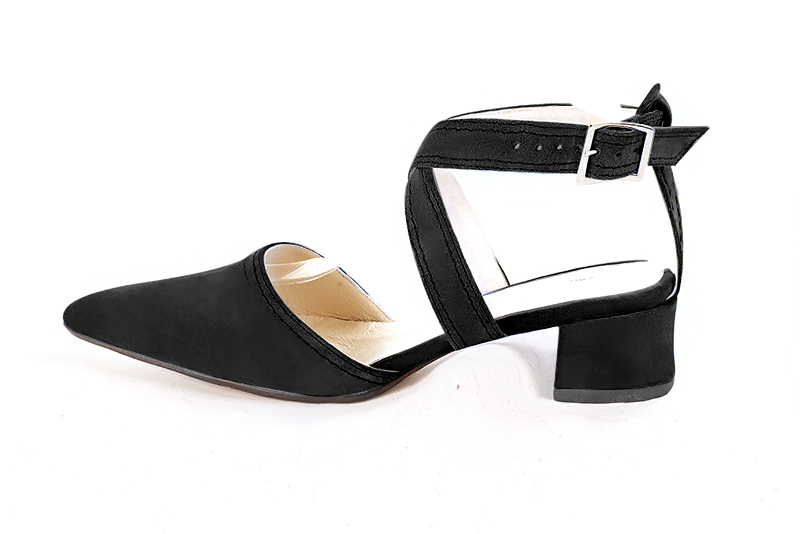 Matt black women's open back shoes, with crossed straps. Tapered toe. Low flare heels. Profile view - Florence KOOIJMAN